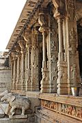 Elephant balustrade and pillars of mantapa in Raghunatha temple in Hampi
