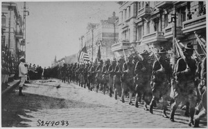 American troops in Vladivostok parading before the building occupied by the staff of the Czecho-Slovaks. Japanese marine - NARA - 533750.tif