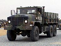 US Marine Corps 030224-M-XT622-034 USMC M923 (6X6) 5-ton cargo truck heads a convoy departing Camp Matilda, Kuwait crop.jpg