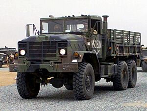 Archivo:US Marine Corps 030224-M-XT622-034 USMC M923 (6X6) 5-ton cargo truck heads a convoy departing Camp Matilda, Kuwait crop