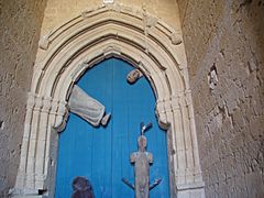 09 Tamara de Campos Iglesia San Hipolito puerta central fachada occidental lou
