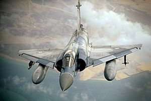 French Mirage 2000 finishes refueling from KC-10A 2009-12-06 mod1.jpg