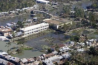 US Navy 071120-M-8966H-005 An aerial view over southern Bangladesh reveals extensive flooding as a result of Cyclone Sidr.jpg