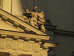 Archivo:Skulpturgruppe dem Haupteingang der Michaelerkirche. Wien 1010. Michaelerplatz. Detalle del grupo escultórico del pórtico de entrada de la iglesia de San Miguel de Viena.