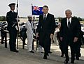 Robert M. Gates and Phil Goff walk into the Pentagon