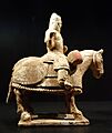 Tomb figurine of a horse with rider, China, Tang dynasty, 618-906 AD, earthenware with traces of red and yellow glaze - Östasiatiska museet, Stockholm - DSC09585