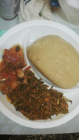 Eba and Efo riro (Vegetable Soup) with Fish.jpg