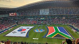 Archivo:South Korea and South Africa flags before their game at World Cup 2026