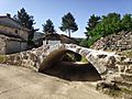 Uno de los puentes de origen romano tras su restauración