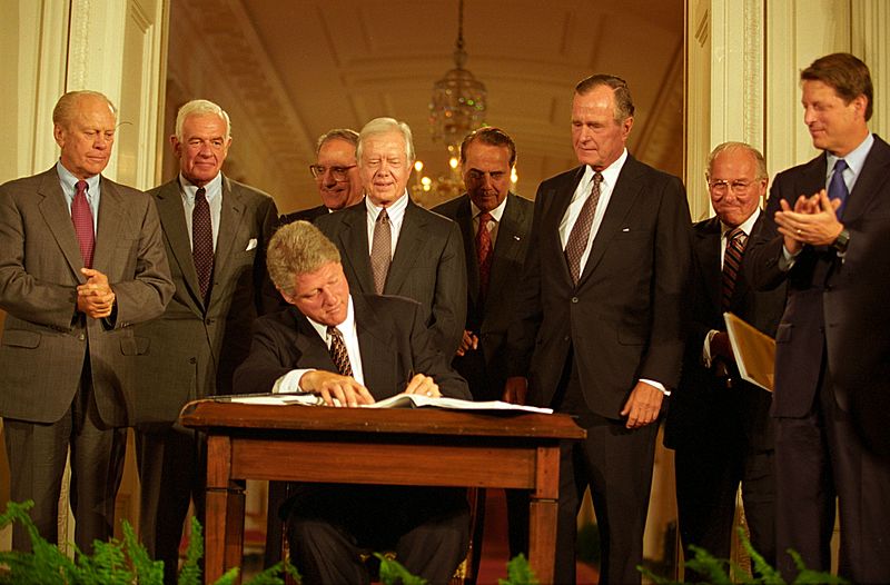 President Bill Clinton signs NAFTA