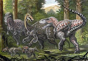 Archivo:Tarbosaurus and Deinocheirus
