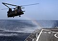 US Navy 090921-N-5126F-006 An MH-47 Chinook helicopter assigned to the 160th Special Operations Aviation Regiment (Airborne) approaches the guided-missile destroyer USS Higgins (DDG 76) to conduct a fast-rope evolution