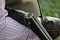 Open breach side-by-side shotgun