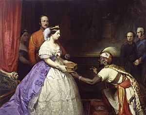 Archivo:The Secret of England's Greatness' (Queen Victoria presenting a Bible in the Audience Chamber at Windsor) by Thomas Jones Barker