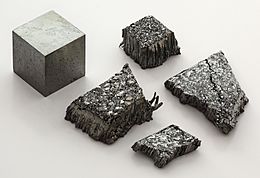 Lutetium sublimed dendritic and 1cm3 cube.jpg
