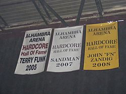 Archivo:Banners for Terry Funk, Sandman, and John 'FN' Zandig at the Hardcore Hall of Fame (2010)