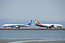 ANA 777 -300 Asiana 777 -2 (28717532866).jpg