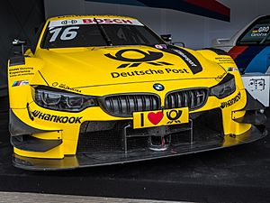 Archivo:BMW M4 DTM Timo Glock, Norisring 2018 (29083938828)