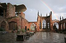 Archivo:Coventry Cathedral Ruins with Rainbow edit