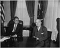 Photograph of Harry S. Truman and JFK in the Oval Office