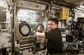 ISS-08 Michael Foale conducts an inspection of the Microgravity Science Glovebox