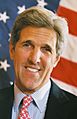 John Kerry headshot with US flag