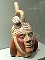 Portrait Bottle with stirrup-spout, 100-700 AD, Moche culture, north coast Peru, earthenware with red and cream slips - Gardiner Museum, Toronto - DSC01215
