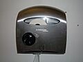Kimberly-Clark automatic toilet paper dispenser