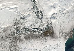 Archivo:Satellite image of Romania in December 2001