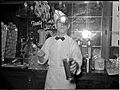 Soda jerker flipping ice cream into malted milk shakes. Corpus Christi, Texas