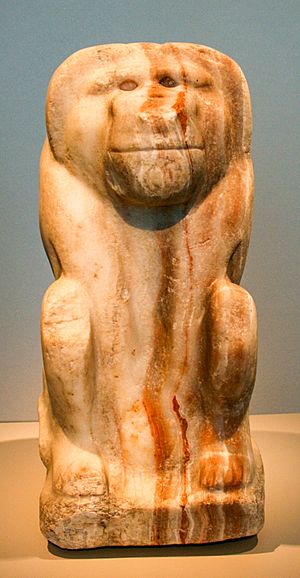 Archivo:Seated figure of a baboon with the cartouche of king Narmer