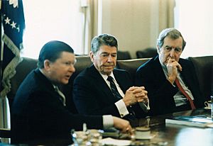 President Ronald Reagan receives the Tower Commission Report with John Tower and Edmund Muskie.jpg