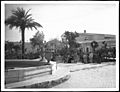 Six people near the fountain in the Plaza de Armas, Guaymas, Sonora, Mexico, ca.1906 (CHS-1533)
