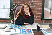 Author Editor Yanitzia Canetti at her desk.jpeg