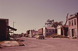 VIEW OF THE MAIN STREET OF WHITE CLOUD, KANSAS, NEAR TROY, IN THE NORTHEAST CORNER OF THE STATE. AT THE EXTREME RIGHT... - NARA - 557155.jpg