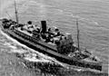 USS Merak (AF-21) underway at sea, 23 June 1943