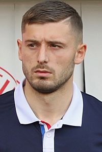 Archivo:Arber Zeneli (Reims; 2019)