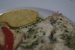Archivo:Merluza (salsa verde)