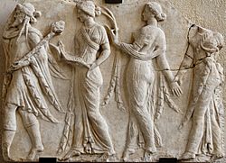 Archivo:Dionysos Horai Louvre MR720