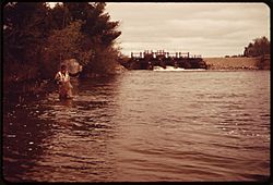 FLY FISHERMAN AT BIG FALLS, GRAND LAKE STREAM, A FAMOUS SALMON STREAM AND PART OF THE EAST BRANCH OF THE ST. CROIX... - NARA - 550317.jpg