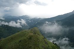 Ella Gap (Valley), dramatic clouds over mountains of Sri Lanka.jpg