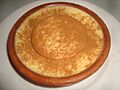 Natilla espolvoreada con la típica canela