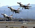 F-16 Fighting Falcons of the Thunderbirds, take off to perform during the air show at Nellis AFB