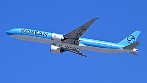 Korean Air Boeing 777-300ER HL8008 departing Boston, April 2025.jpg