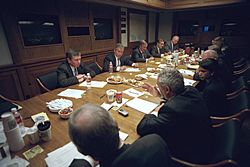 Archivo:After addressing the nation, President George W. Bush meets with his National Security Council