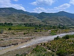Landscape of Xocalı District with Qarqar river in the foreground.jpg