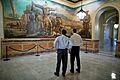 Kansas Governor Sam Brownback (left) and U.S. Secretary of Education --Arne Duncan observe a mural at the Kansas State Capitol in 2012