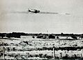Argentine AT-6 is attacking column of vehicles in april 1963