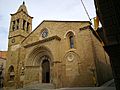 Torre y portada de acceso principal.  Santa María de Agramunt, Lérida.