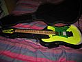 Ibanez RG maple fretboard with Fluorescent Yellow in the case